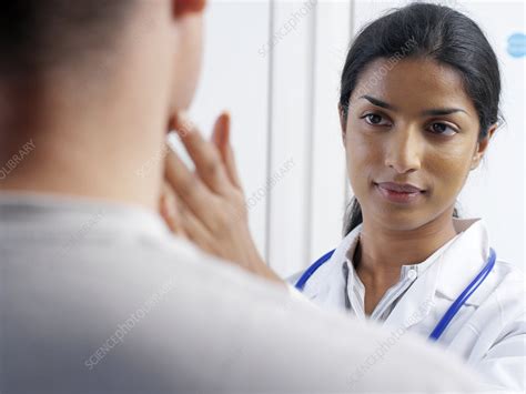 doctor examining a patient stock image m541 0401 science photo library