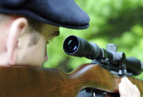 Man Looking Through Scope On A Rifle Gun Stock Image Everypixel