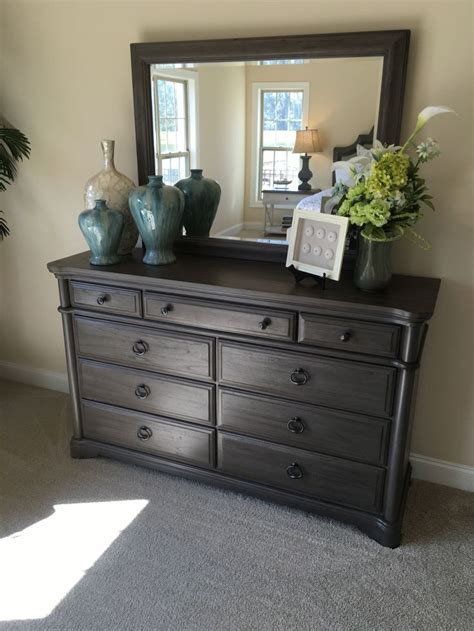 Keep your small bedroom layout open. How to stage a bedroom dresser with vases, urns, frames ...