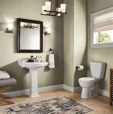 A list of modern bathroom wall decor ideas filled with funny prints, wall plaques, industrial shelving, modern geometric tiles, and quirky toilet paper holders. Behr Back To Nature Paint Color - Color Of The Year 2020 - Setting for Four