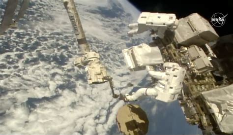 Spacewalking Astronauts Add New Pumps To Cosmic Detector AP News