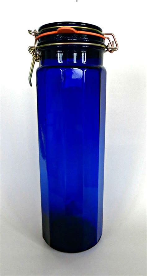 4 vintage cobalt blue ceramic kitchen canisters by rococodecor. Vintage Cobalt Blue Glass Storage Canister by ...