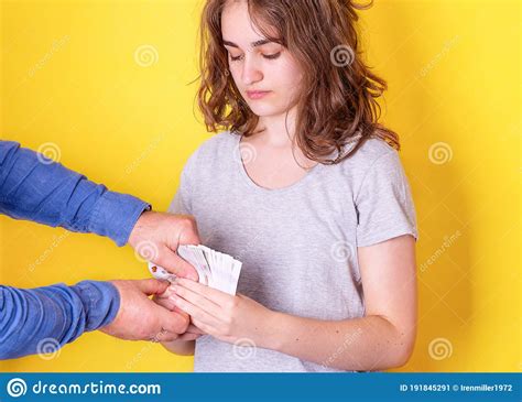 Unhappy Young Woman Holding Money And Man Taking Away Money The Payment Holiday Came To End