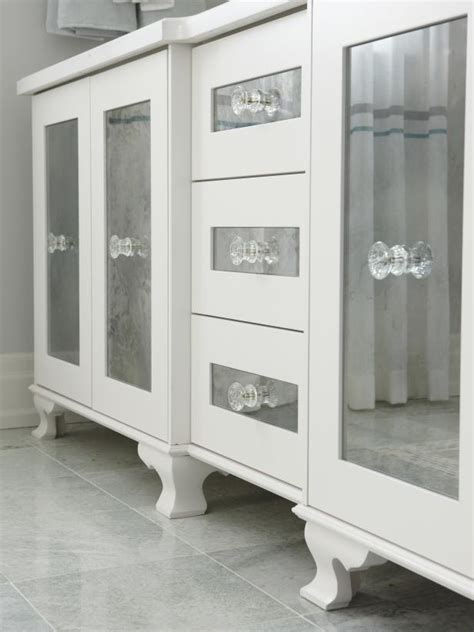 The bathroom doors like glass doors, sliding doors and pcv doors are space savvy and also allows attractive décor. White Master Bathroom Vanity with Etched Glass Door Fronts ...