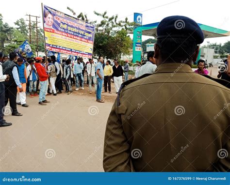 Indian Police Officer Watching Political Road Show During Duty In India
