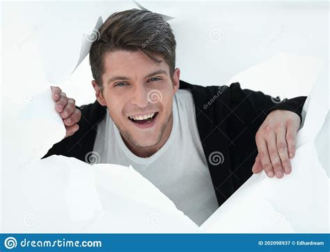 Young Businessman Breaking Through A Paper Wall Stock Image Image Of