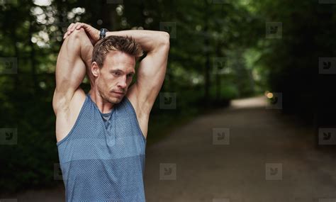 Athletic Man Stretching Arms Behind His Head Stock Photo 140133