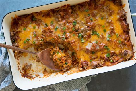 Brown some ground beef, add cream cheese and spices, sprinkle with. Beef Enchilada Casserole