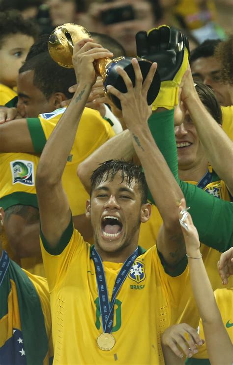 The two global soccer stalwarts — here sporting. Brazil beats Spain 3-0 to win Confederations Cup
