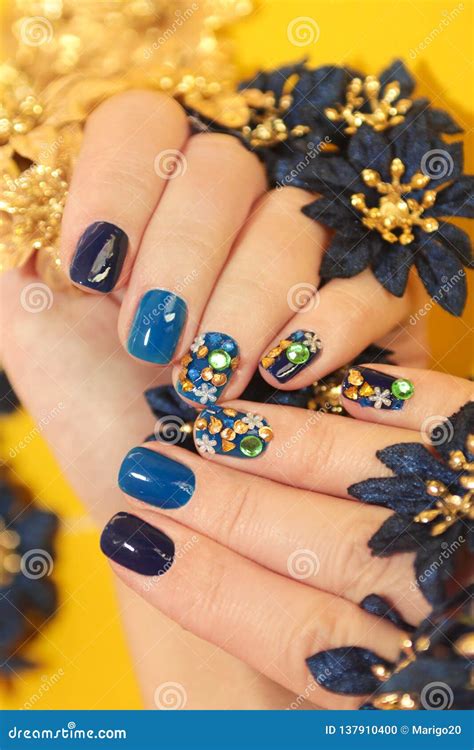 Bright Blue Manicure With The Design Of Rhinestones Stock Photo Image