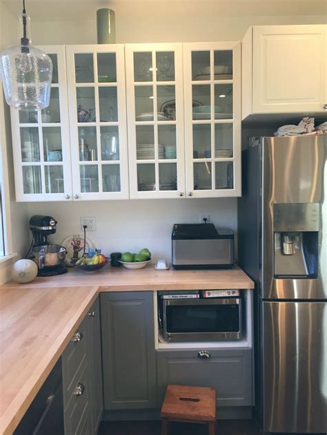 Ikea kitchen cabinet doors are a great way to save money—but you can still make them look custom. Downton Abbey IKEA kitchen: BODBYN glass doors in white for the wall cabinets, and BOD ...