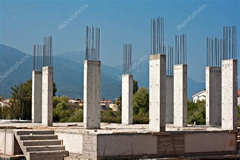 Reinforced concrete pillars on building site — Stock Photo © illu #31143663