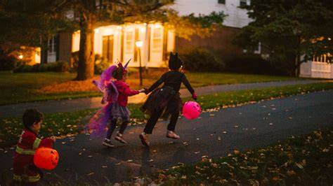 Walking Down The Street On A Halloween Night - 13 ways to get great photos of kids on Halloween - TODAY.com