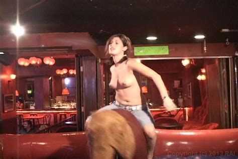 Hot Brunette Rides A Mechanical Bull Topless From Dream Girls Naked SexiezPicz Web Porn