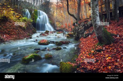 Beautiful Waterfall In Autumn Forest In Crimean Mountains At Sunset