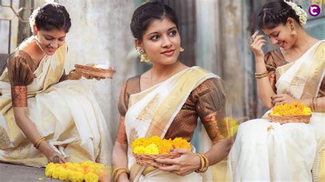 Monisha Blessy Dazzles In Onam Photoshoot A Star In White Kerala Saree