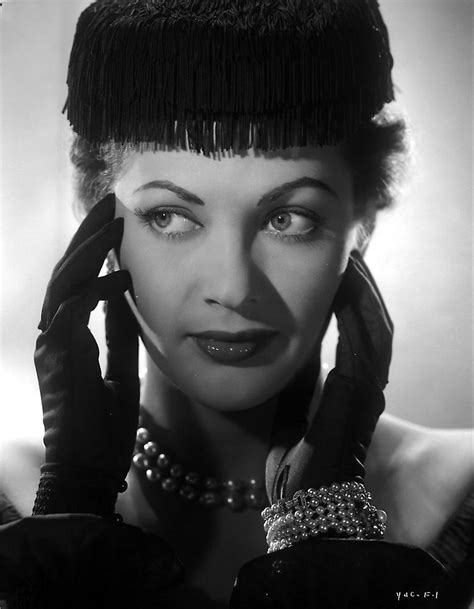 Yvonne Decarlo Posed In A Portrait While Touching Her Head In Black And