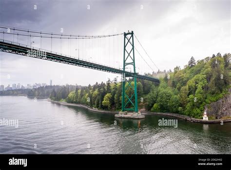 Lions Gate Bridge Over The Burrard Inlet At The Edge Of Stanley Park