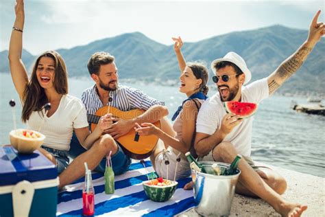 Young People Having Fun At Beach Party Stock Photo Image Of Happy