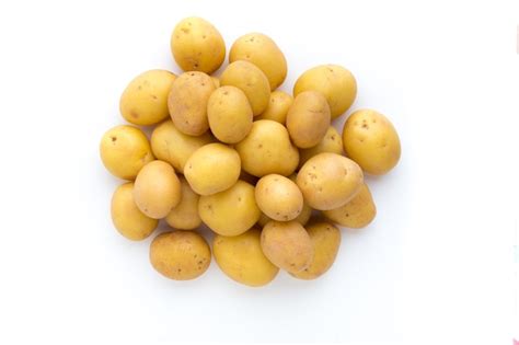 Premium Photo Close Up Of Potatoes On A Bright Background