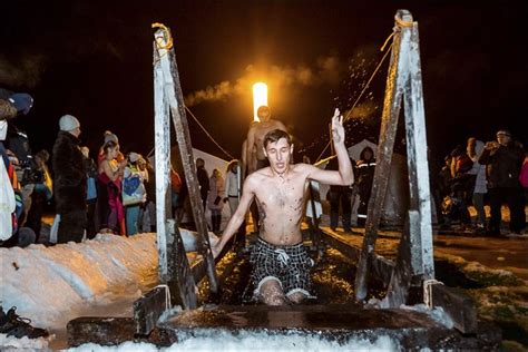 Taking The Plunge In Icy Siberian Waters Locals Mark Orthodox Epiphany