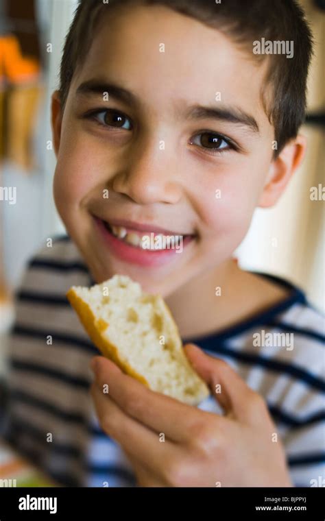 Boy With Bread Stock Photo Alamy