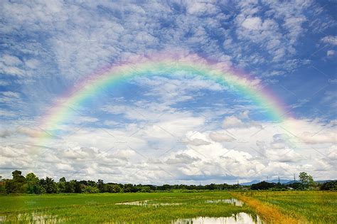Beautiful Of Rainbow In Blue Sky Nature Stock Photos Creative Market