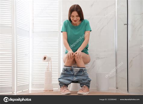 Woman Suffering Hemorrhoid Toilet Bowl Rest Room Stock Photo By Newafrica