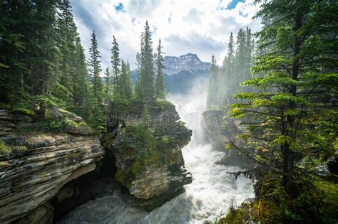 Very Misty Morning View Of Athabasca Falls Waterfall In Jasper National