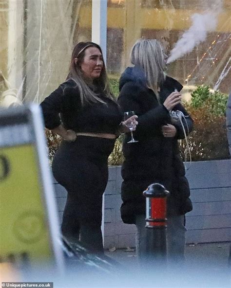 Lauren Goodger Flashes Her Midriff In A Black Crop Top And Leggings As She Enjoys Dinner With
