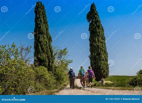 ASCIANO TUSCANY Italy Trekking Unknown People Walking Along
