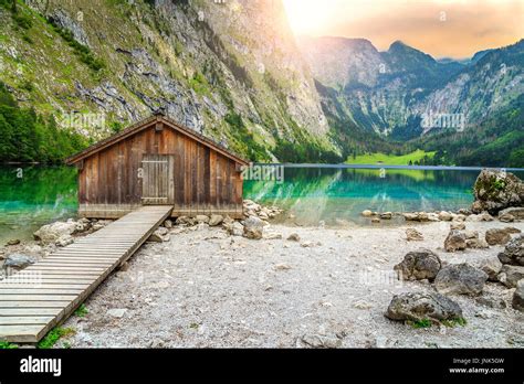 Beautiful Landscape With Wooden Boathouse On The Mountain Lake In
