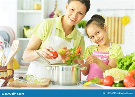Mom And Daughter On Kitchen Stock Image Image Of Breakfast Cooking 117156023