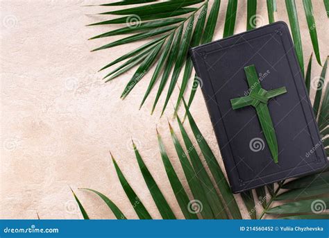 Palm Sunday Concept Palm Cross On Open Holy Bible And Palm Leaves