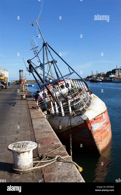 An Abandoned Fishing Boat In Newlyn Harbour Cornwall England Uk