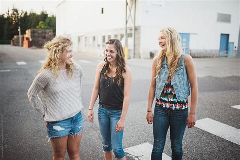 Group Of Real Teenage Girls Laughing Together Outside By Stocksy Contributor Rob And Julia