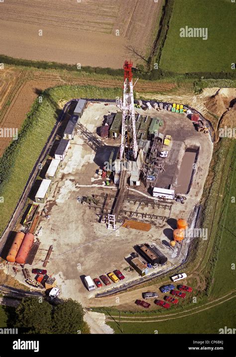 Aerial View Of A Drilling Rig On Dry Land Exploring For Gas Stock