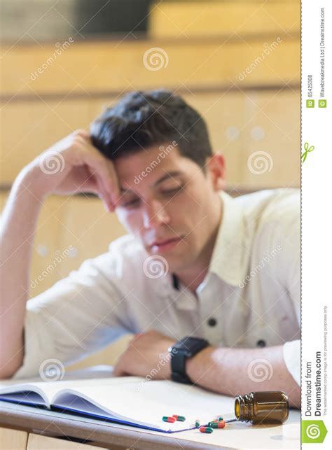 Anxious Male Student During Exam Stock Photo Image Of Depressed