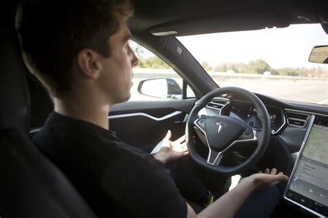 Teslas Autopilot Lets Cars Drive Change Lanes Themselves The Boston