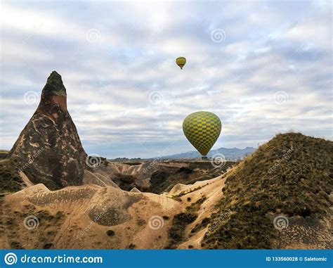 Hot Air Balloon Fly Over Cappadocia Turkey Stock Photo Image Of Cave