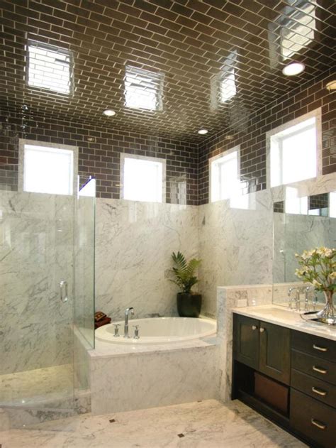 Plastic bathroom ceiling tiles are a better choice. Loft Bathroom With Brown Tile Ceiling and Marble Partition ...
