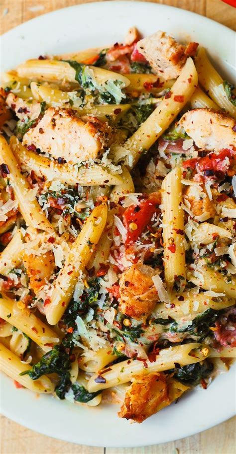 Chicken And Bacon Pasta With Spinach And Tomatoes In Garlic Cream Sauce