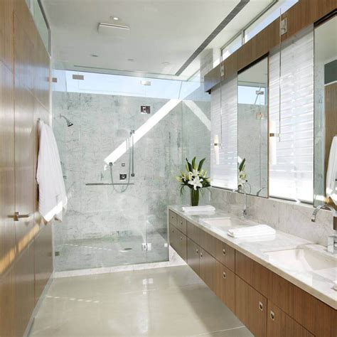 Since carrara marble has a blue undertone, i wouldn't call this the best choice even though it here's another bathroom with carrara marble that is painted in white. Marble Tub Surround White Marble bathroom wall panel