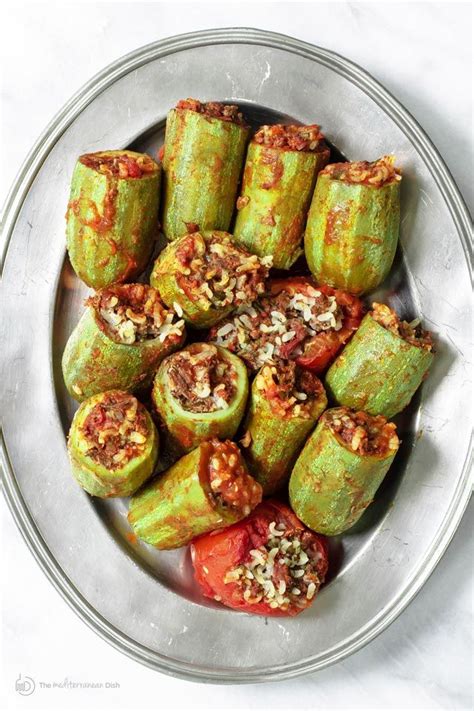 Stir in cumin, turmeric and rice; An all-star stuffed zucchini recipe with a special Middle ...