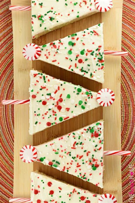 We started with a 9×13 sheet cake. Christmas Tree Sheet Cake Pops ~ tender vanilla sheet cake is slathered in cream cheese fro ...