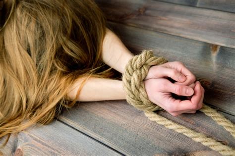 Twin Brothers Tied Up With Rope Isolated On The White Premium Photo