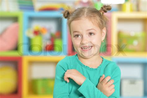 Portrait Of A Little Girl Making Funny Faces Stock Image Colourbox
