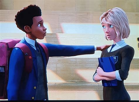 two animated people standing next to each other