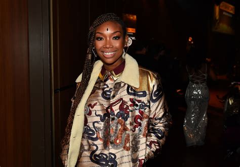 Brandy of 'Moesha' Fame Stuns with Her Blonde Braids & Colorful Makeup in Gorgeous Photo
