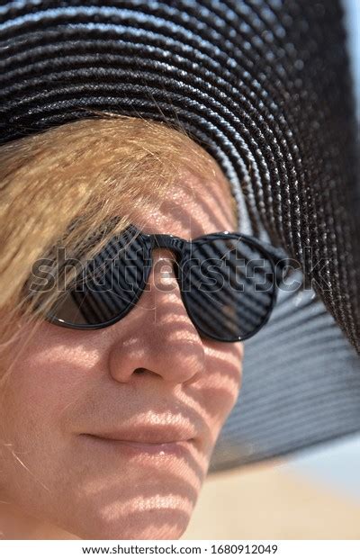 Portrait Middle Aged Blonde Woman Sunglasses Stock Photo 1680912049